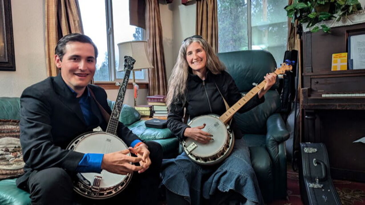 Mom and son who take banjo lessons